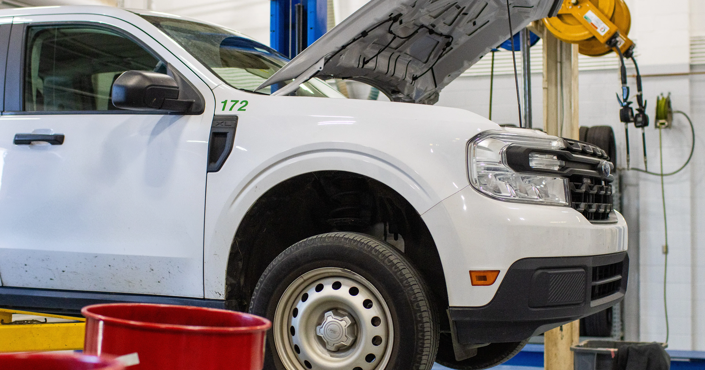 Municipal fleet maintenance vehicle in service bay managed with Fleetio fleet management software