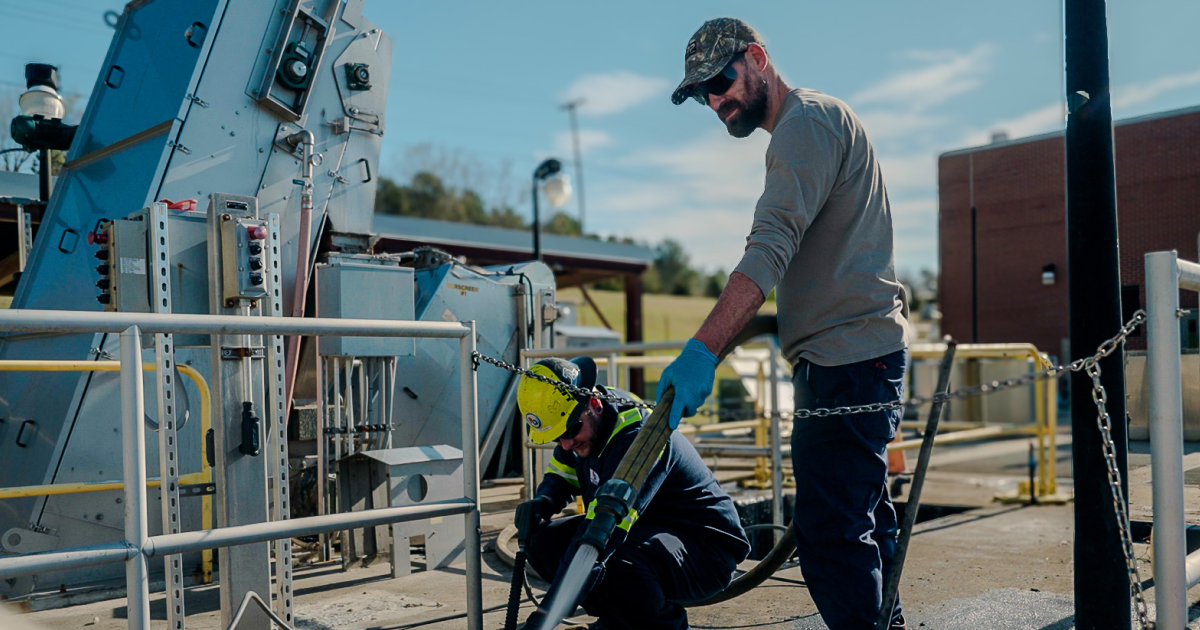 Two employees of A&D Environmental at work