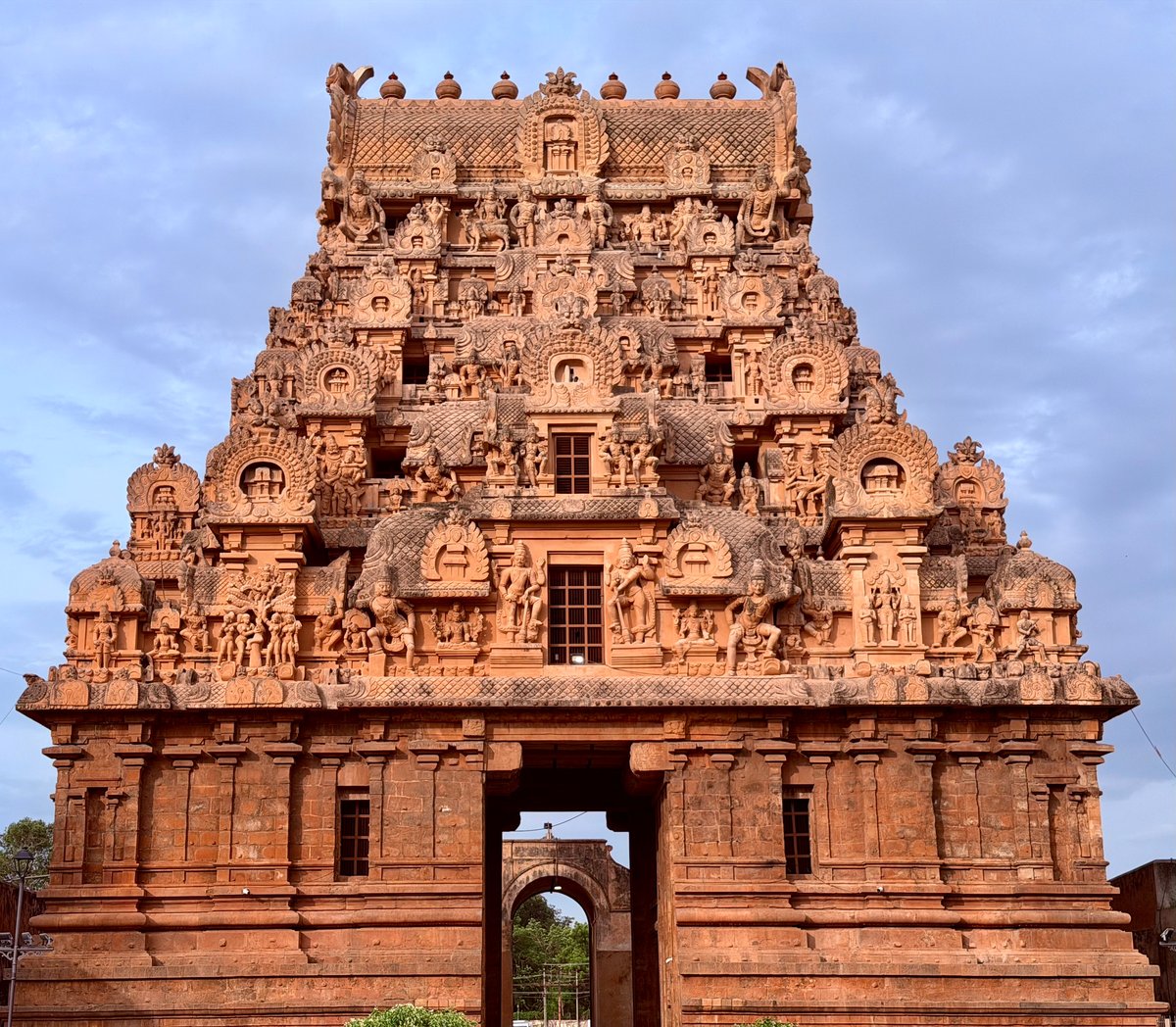 The Keralantakan gopuram, front-on — the full tower visible with the arch at the base. The arch is a later addition; the original Chola entrance was different. History layered on history.