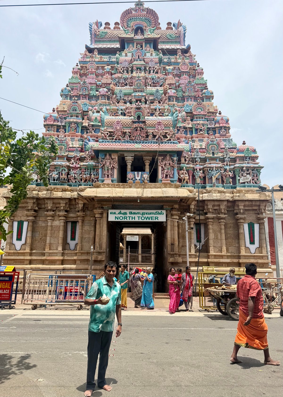 Papa outside the North Tower, coconut in hand