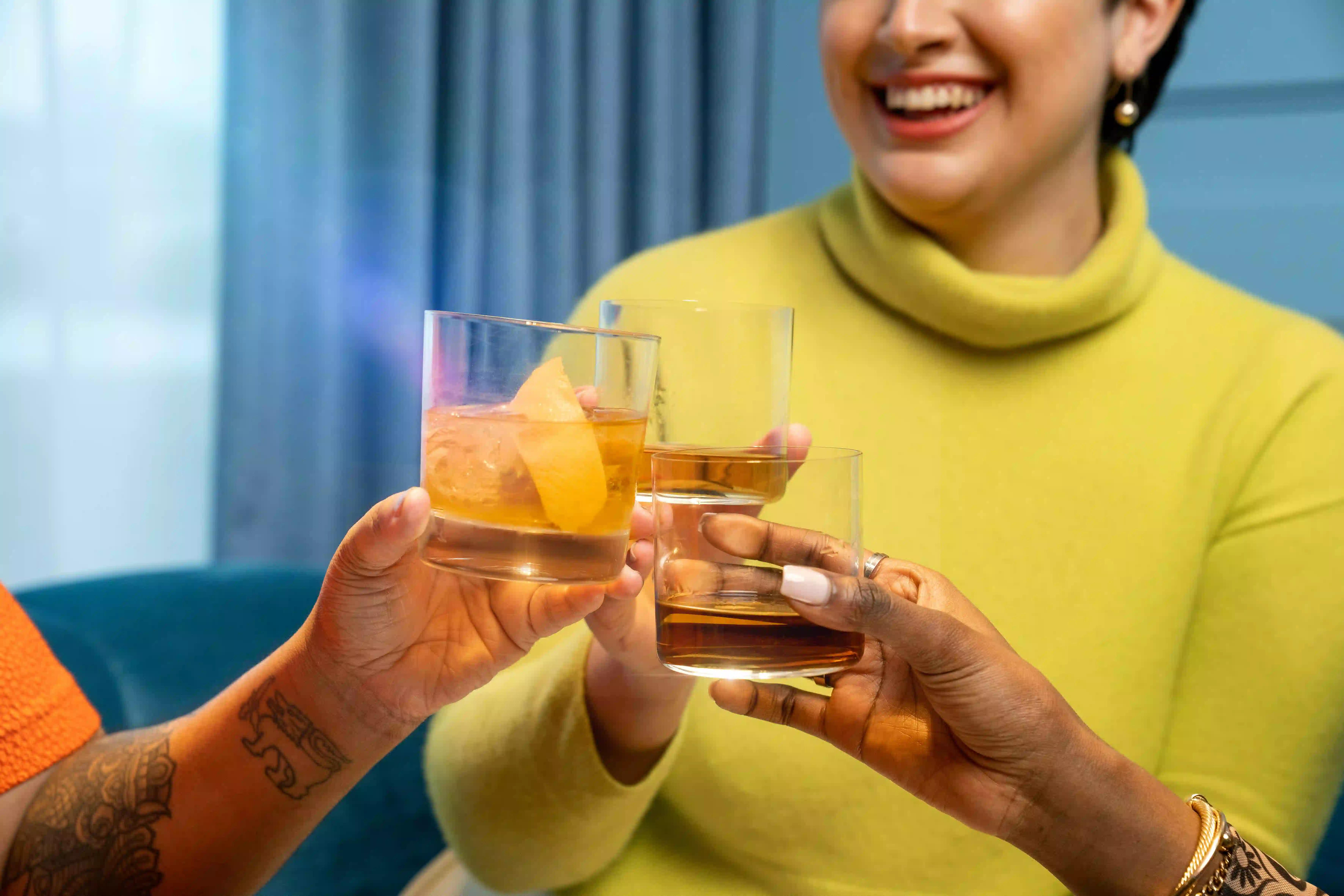 People drinking whiskey