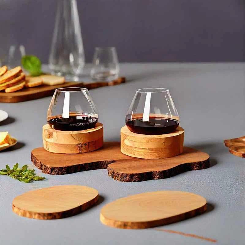 Two Aequilibrium Wine Glasses on wooden coasters