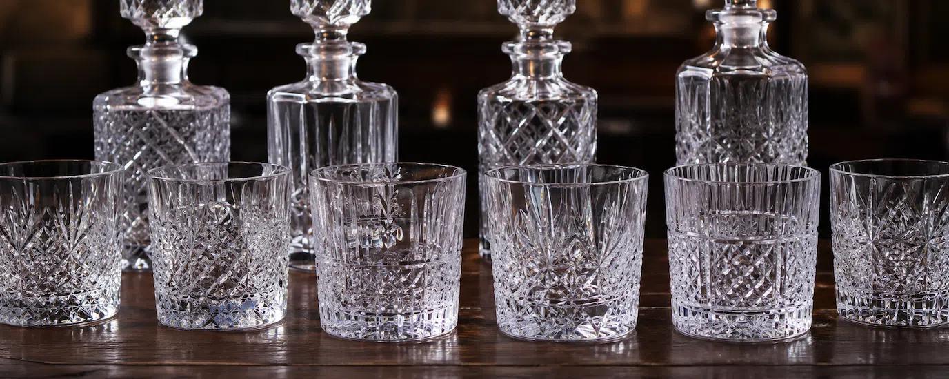 A lineup of Stuart Crystal whisky tumbler glasses