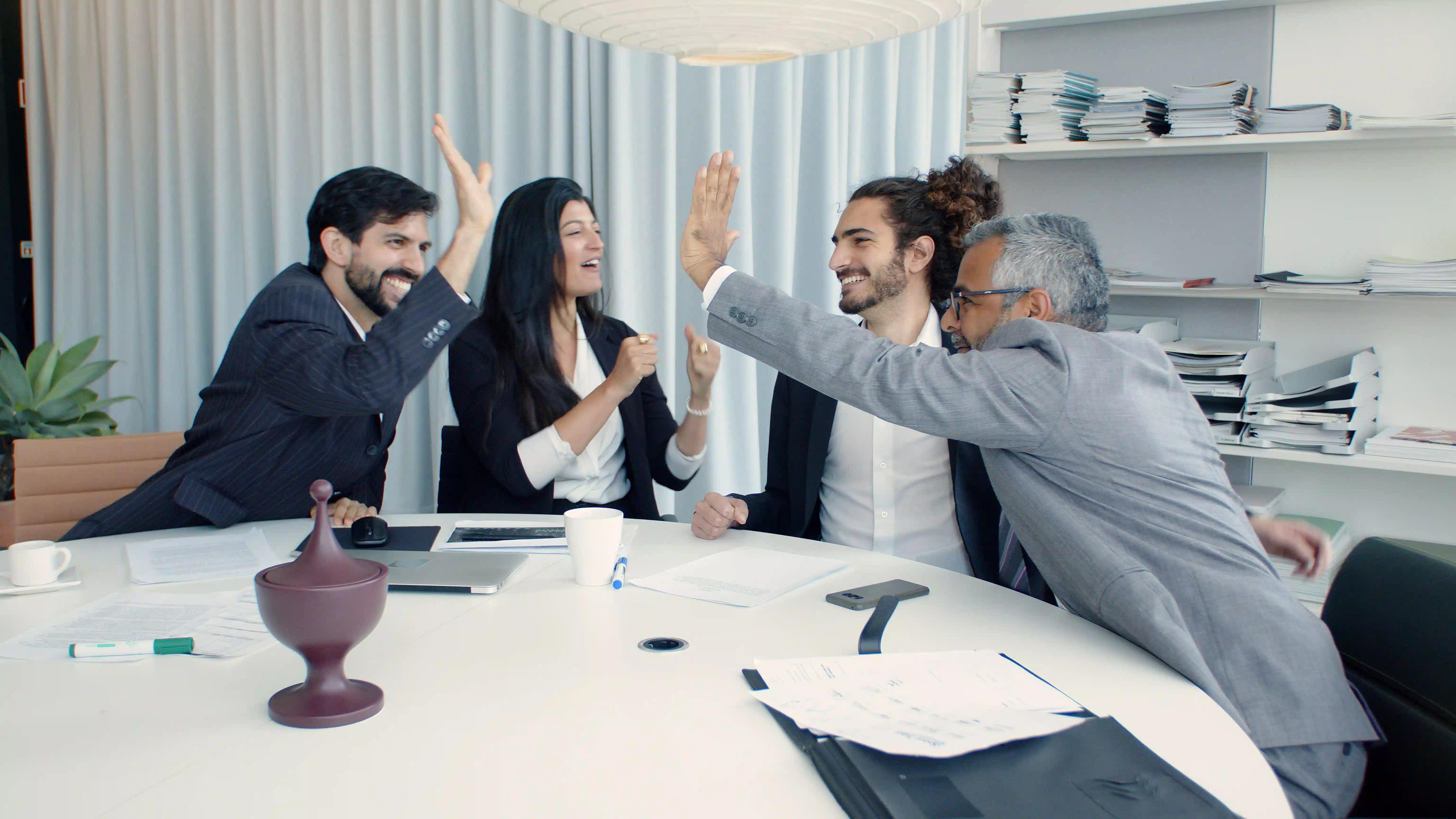 Executives celebrating