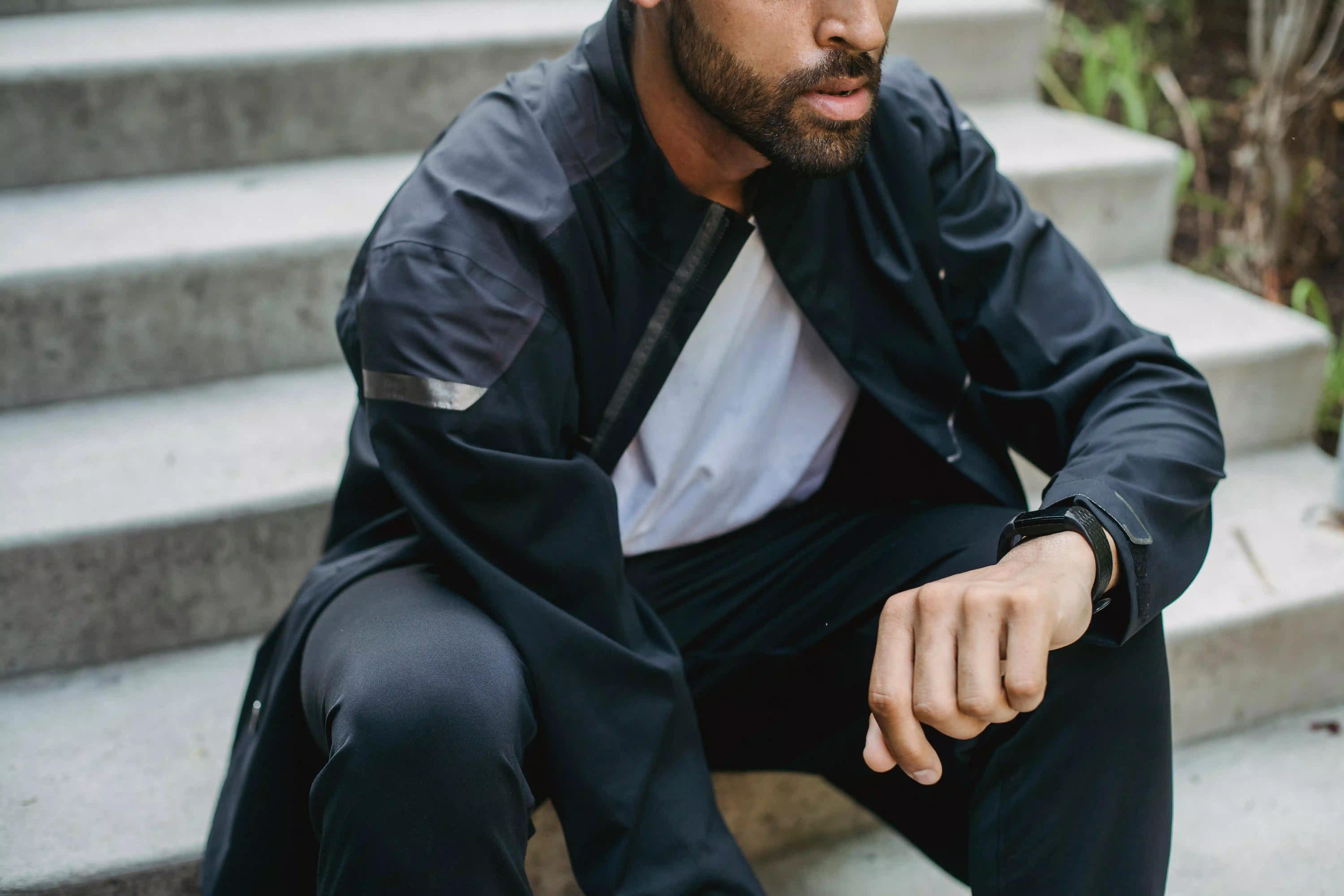 A man wearing a fitness watch