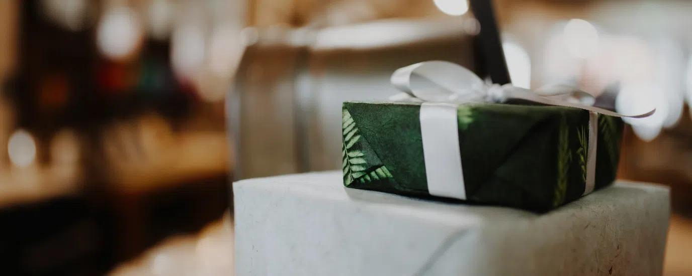 Two gift boxes stacked on a table
