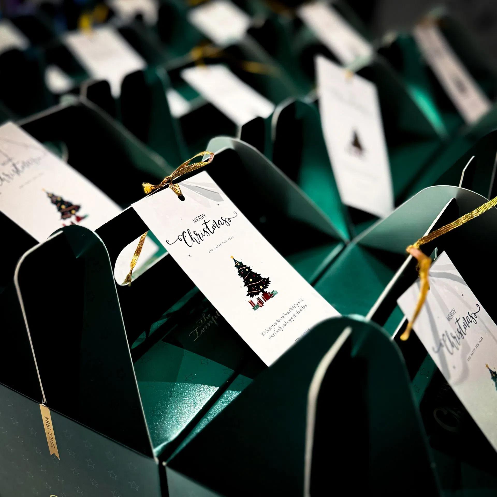 Corporate holiday gifts in green box packaging