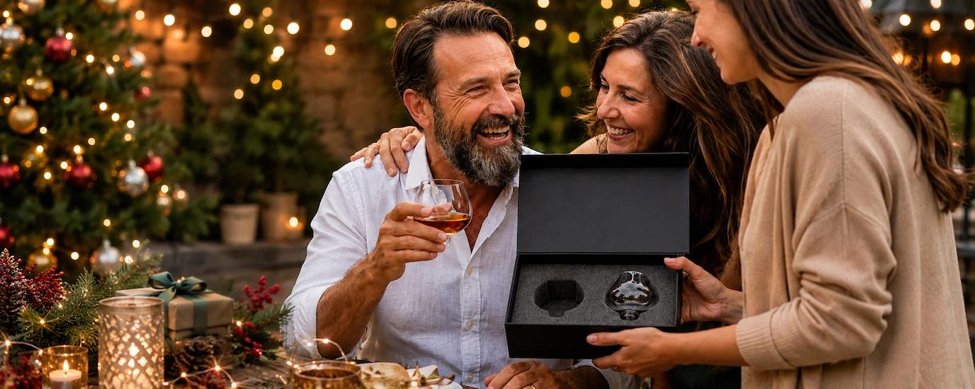 A man receiving the Audacem Aequilibrium Spirit Glass as a Christmas gift