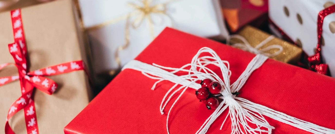 A pile of christmas gifts in festive wrapping