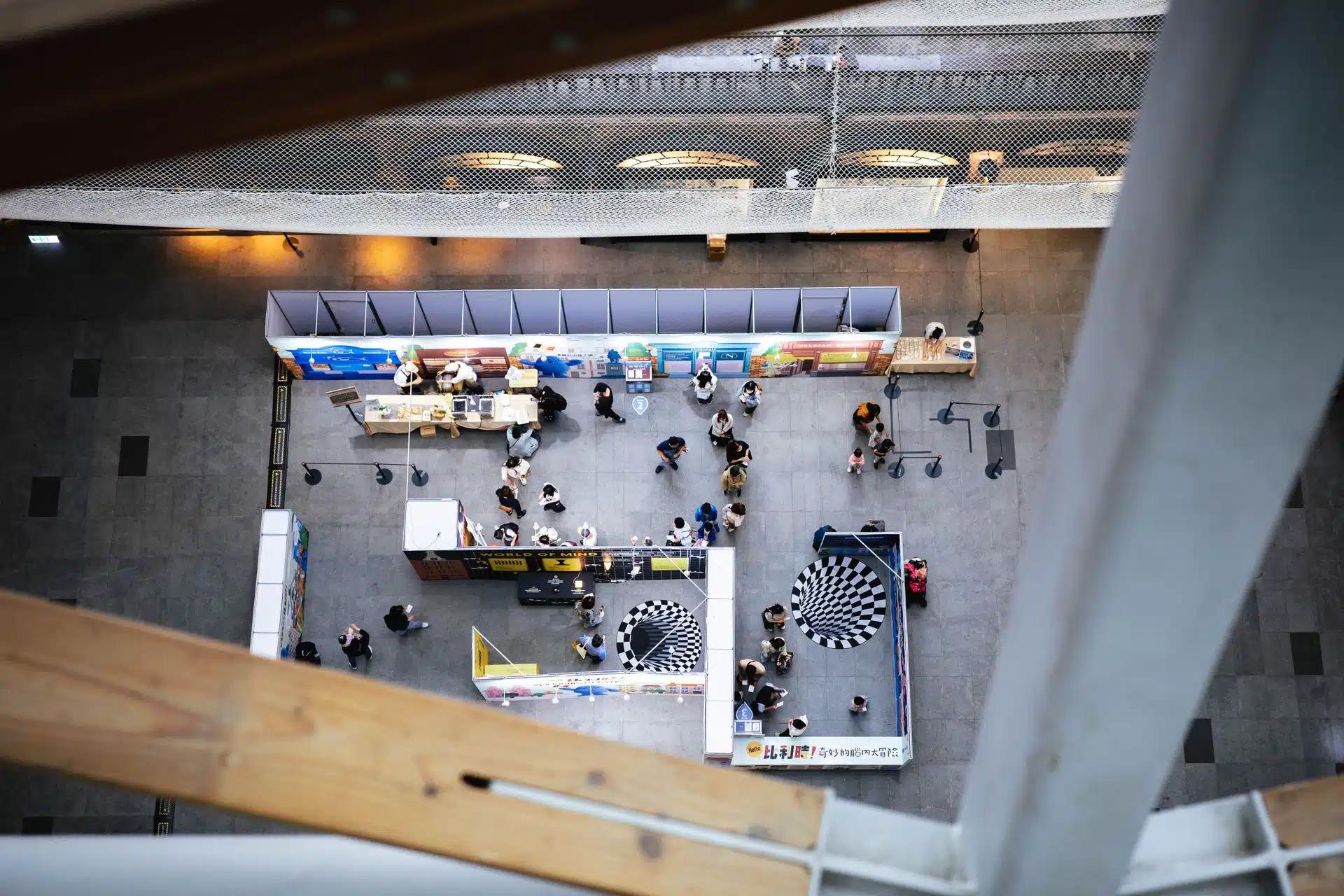 Top view of a bustling indoor exhibition space in Taipei, Taiwan