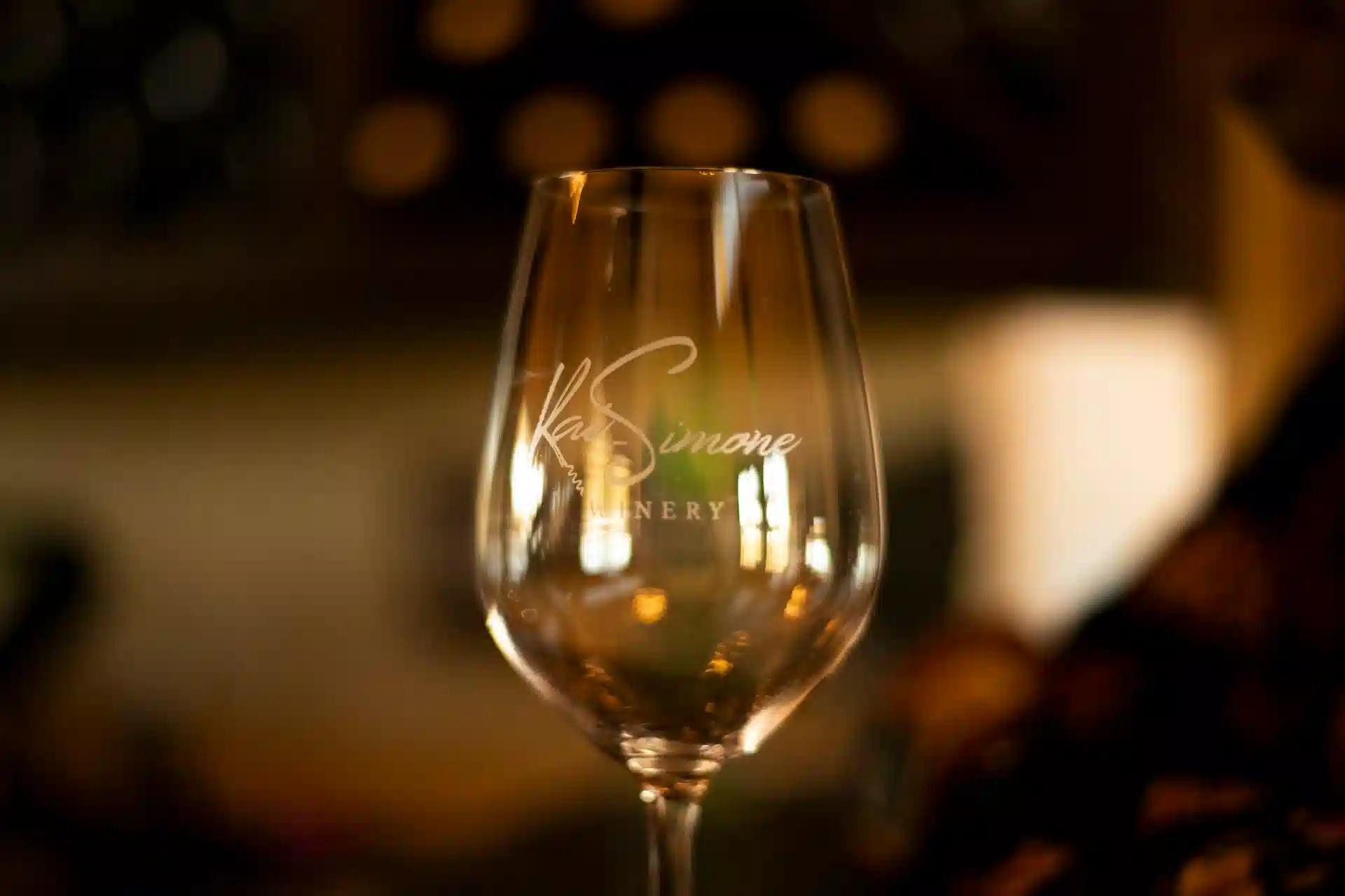 a close up of an engraved wine glass