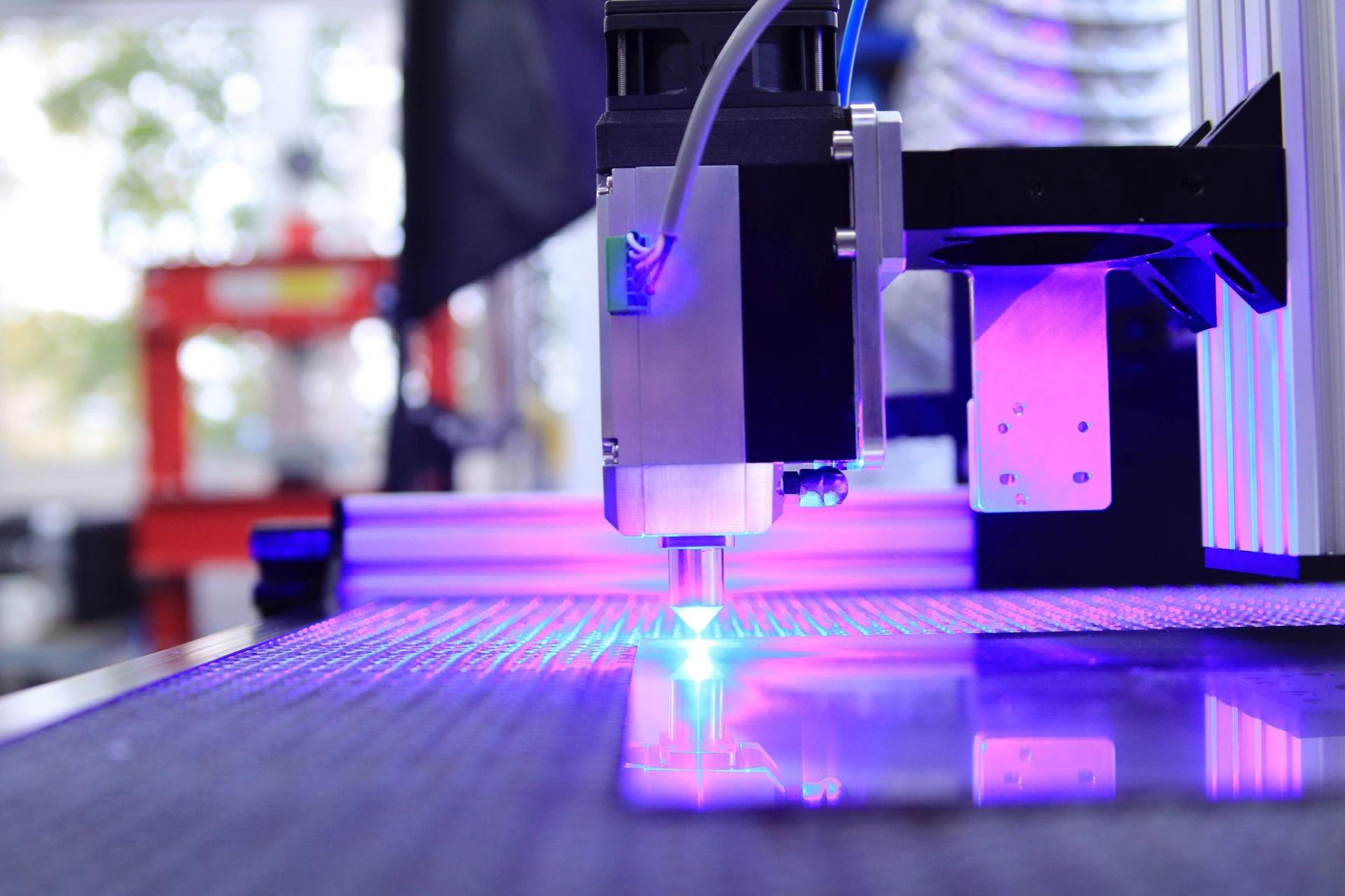 A laser engraving machine at work