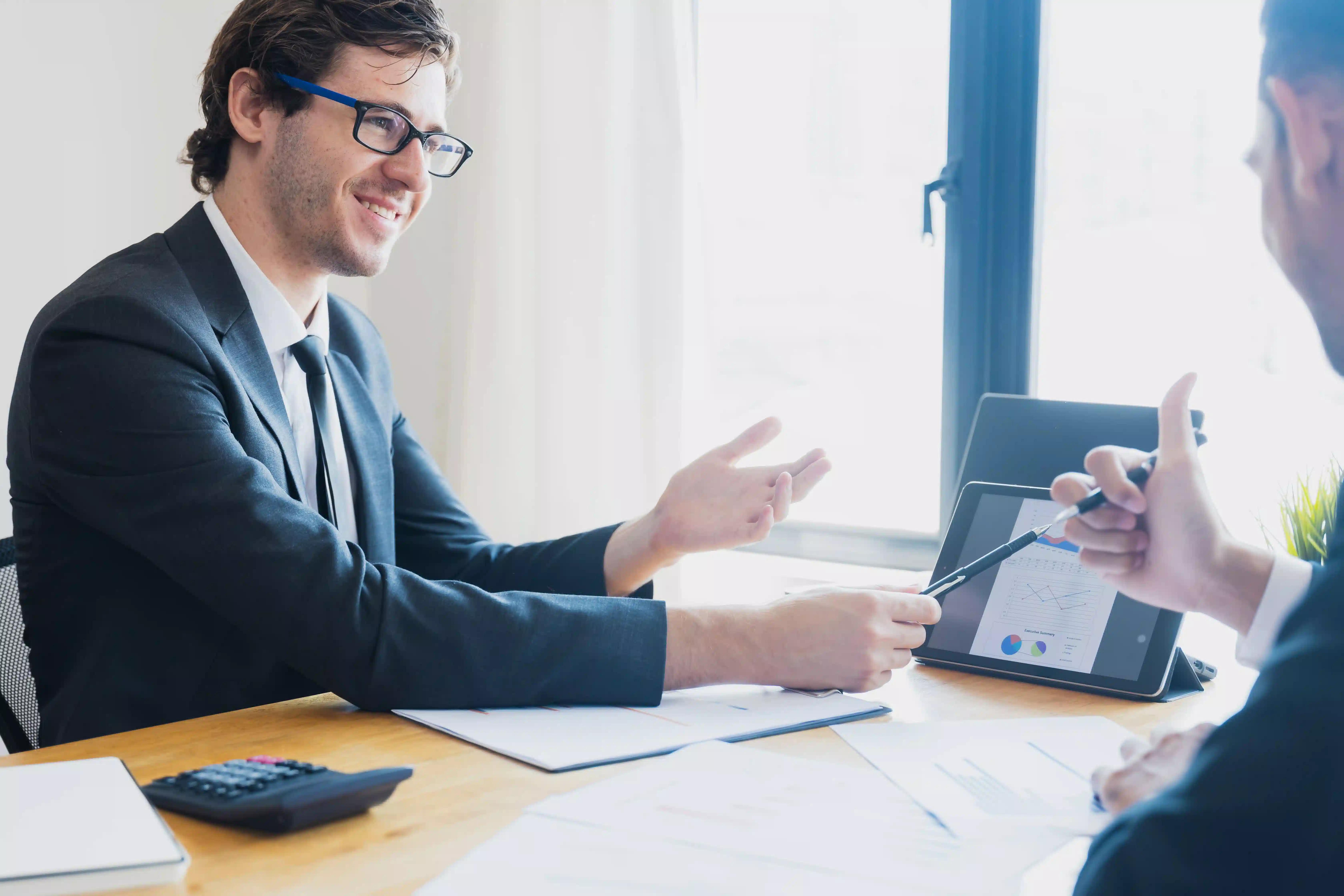 A man explaining to his client