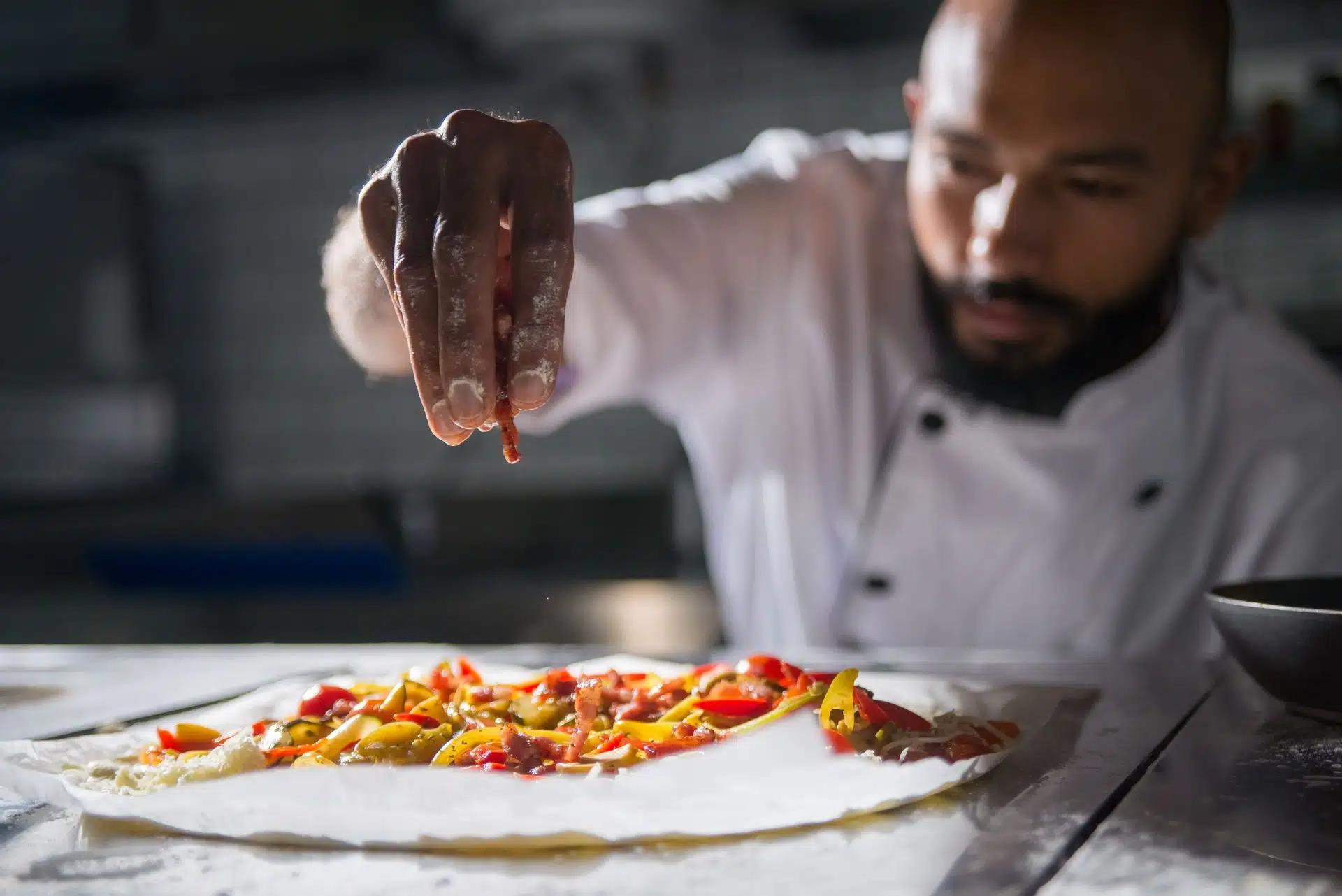 Professional chef preparing a dish