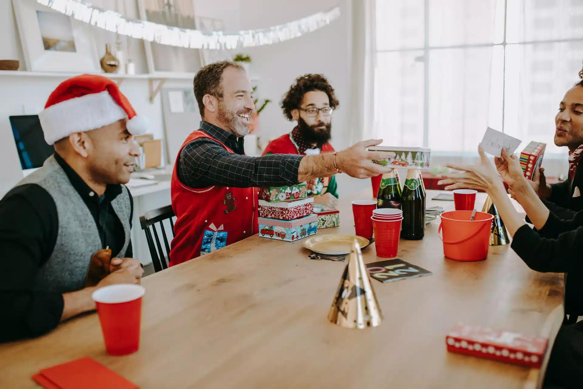 Employees exchanging gifts in an office
