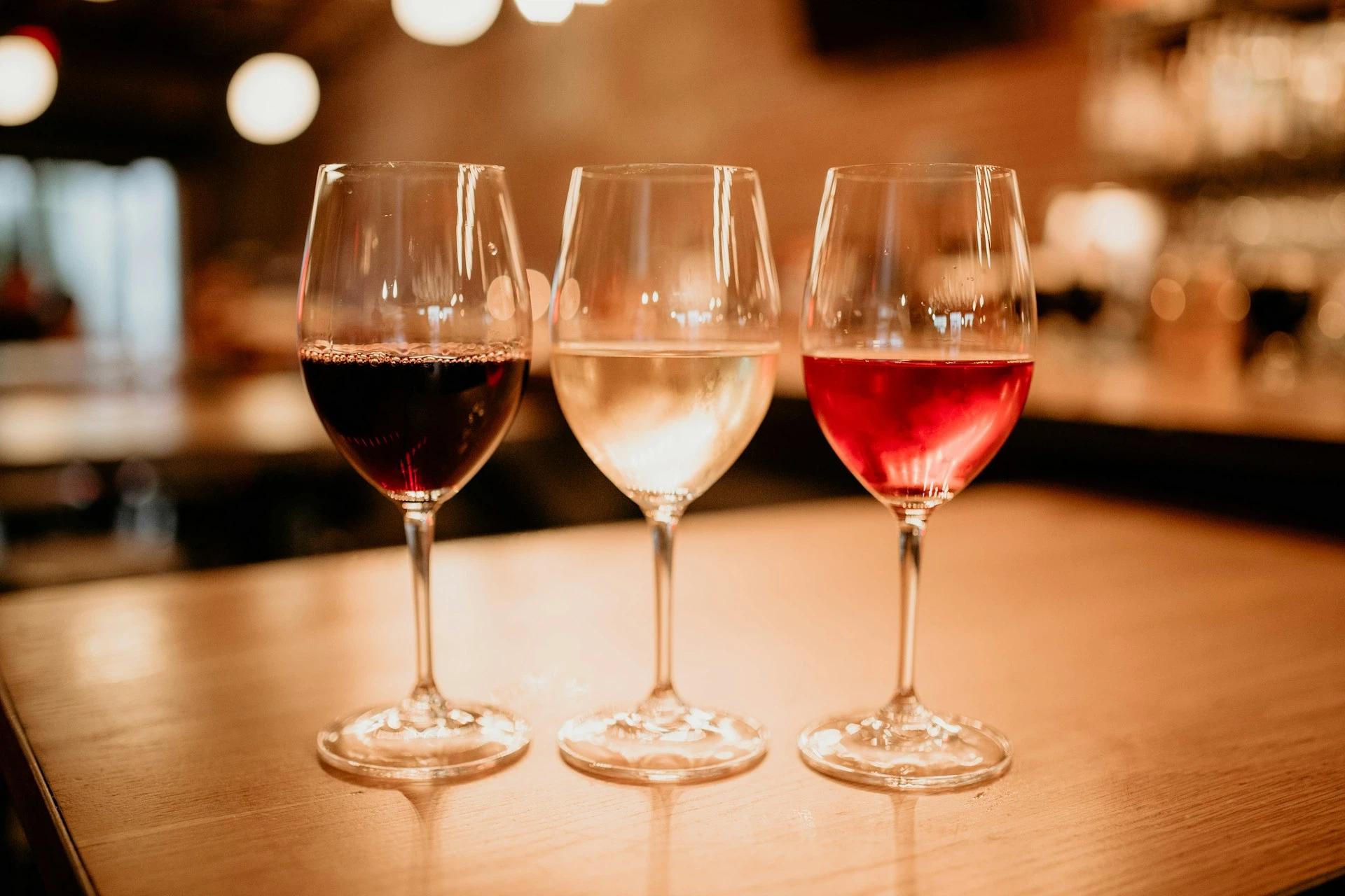 Three different types of wine on a table