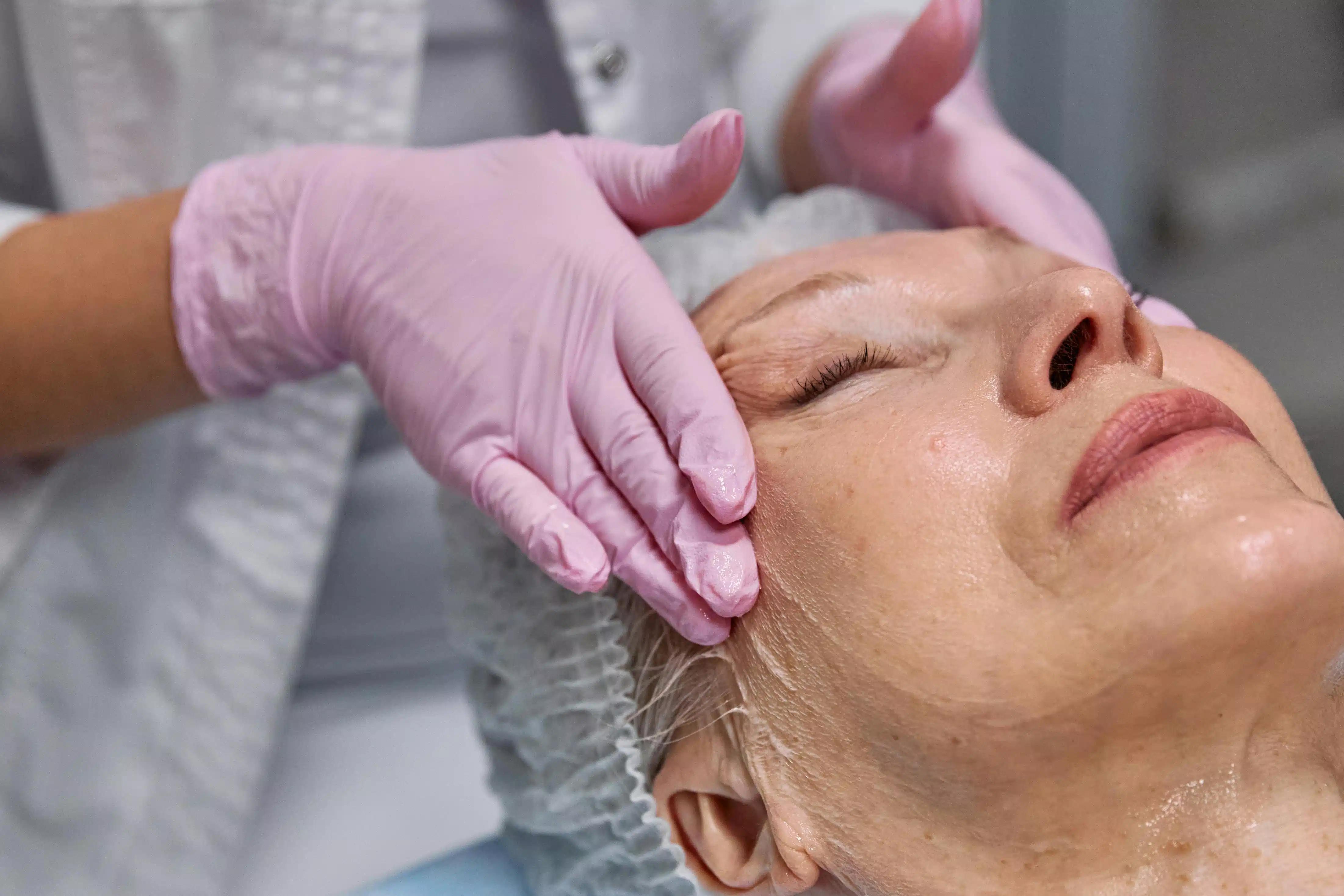 Older woman having a spa treatment