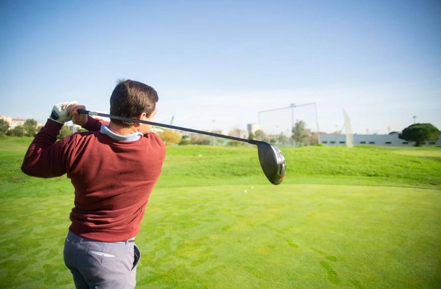 A man playing golf