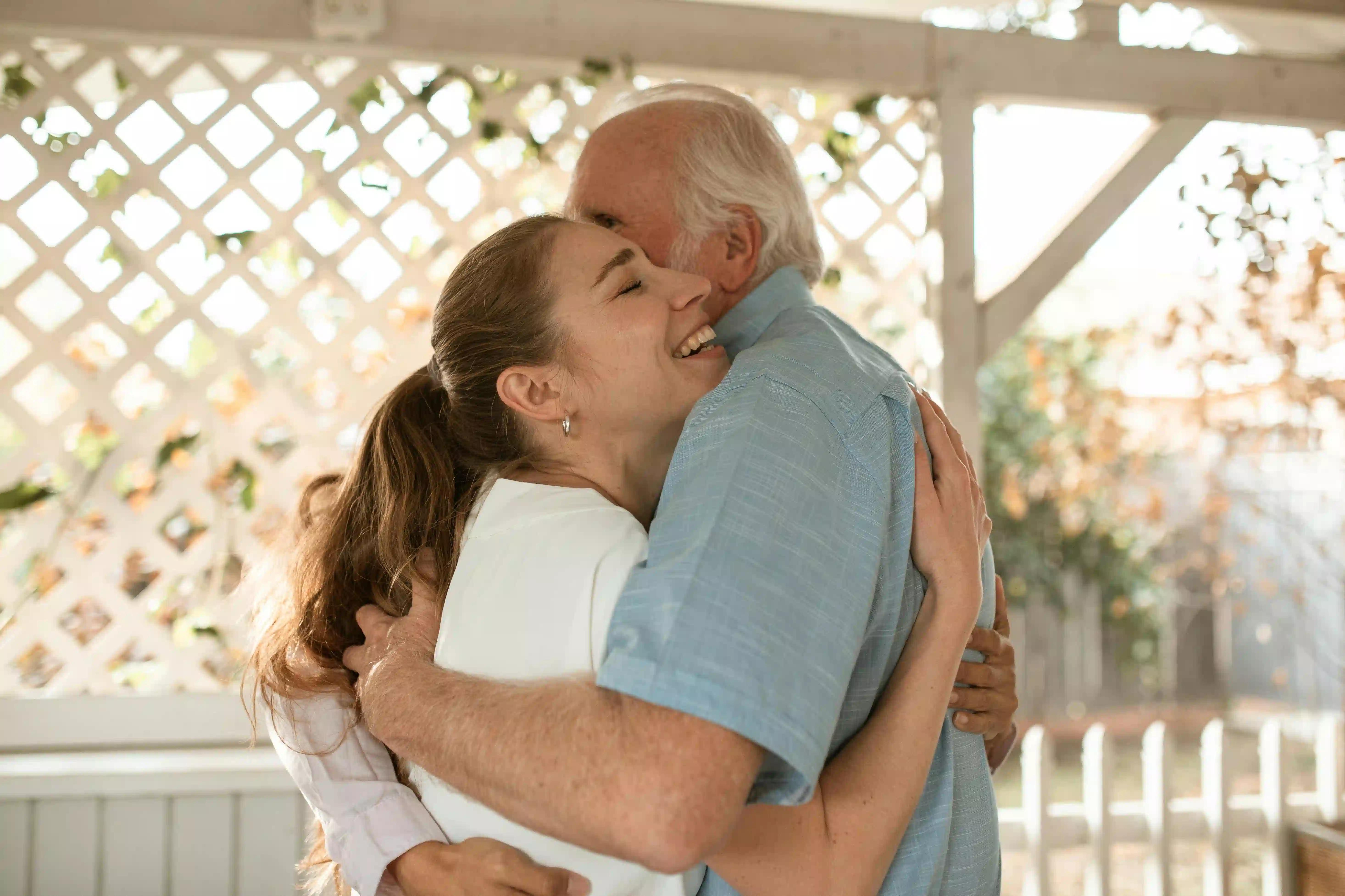 Father and daughter hugging