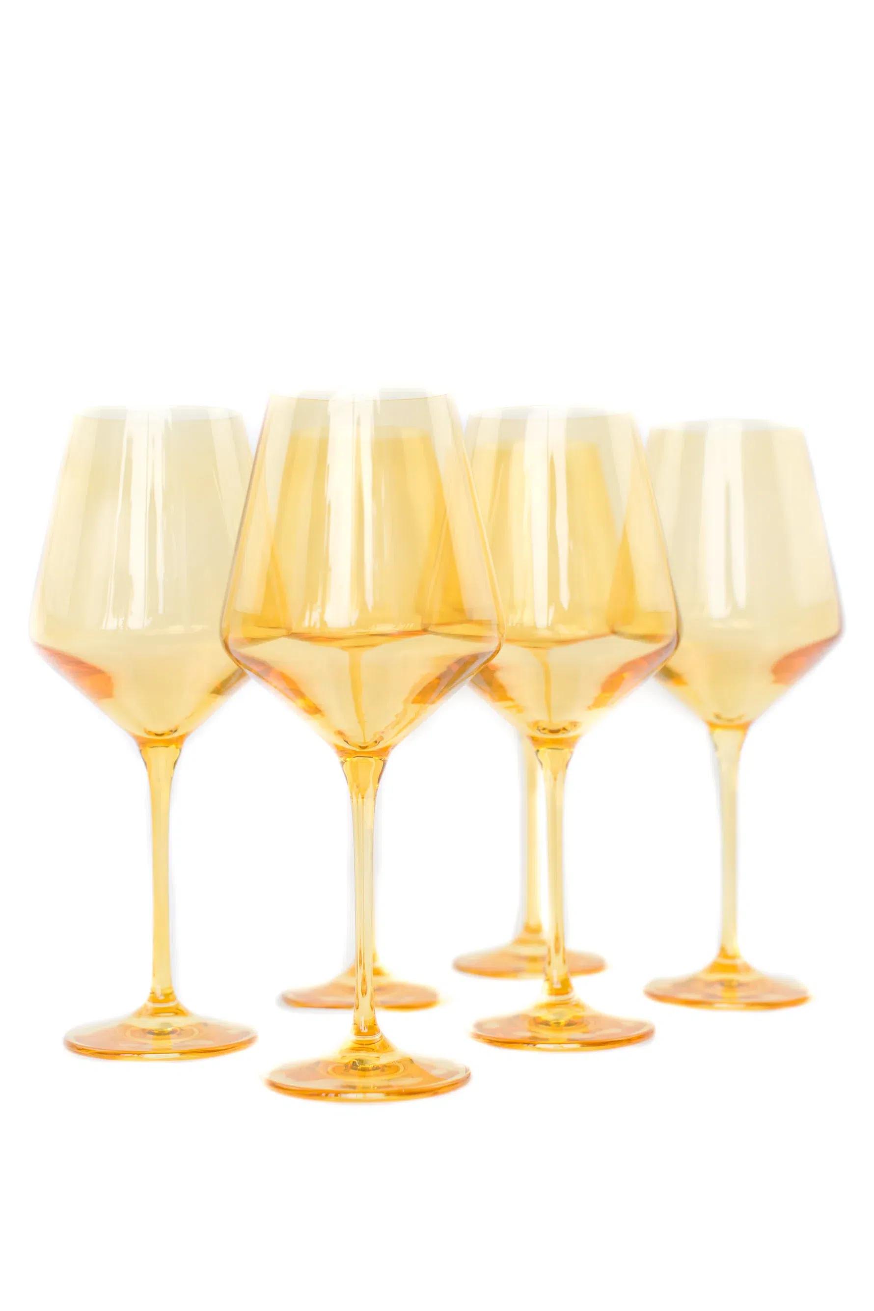 A set of Estelle colored wine glasses in gold