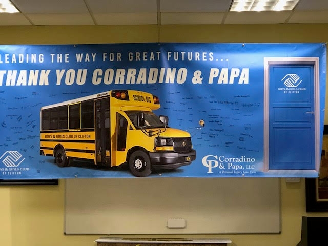 Image Corradino and Papa School Bus Donation Banner