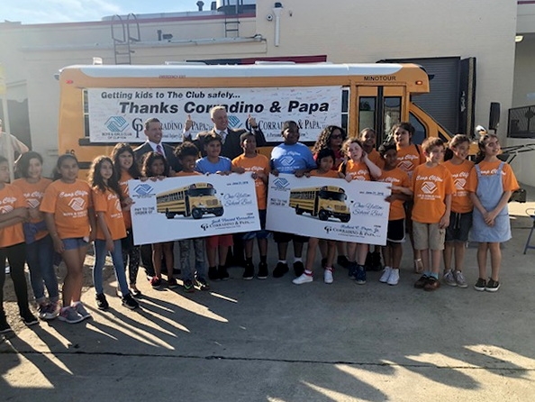 Corradino and Papa School Bus Donations Photo