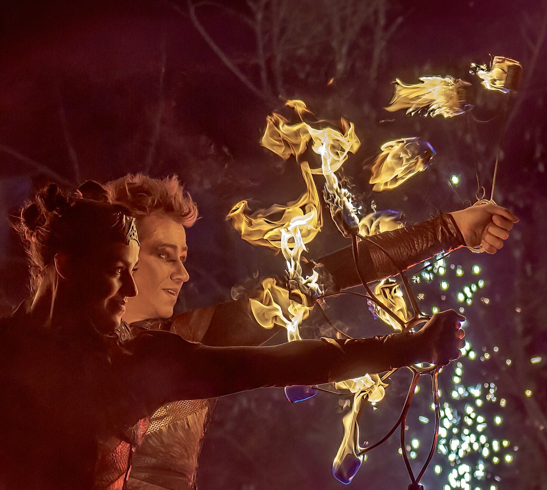 duo fire performer couple fire fan