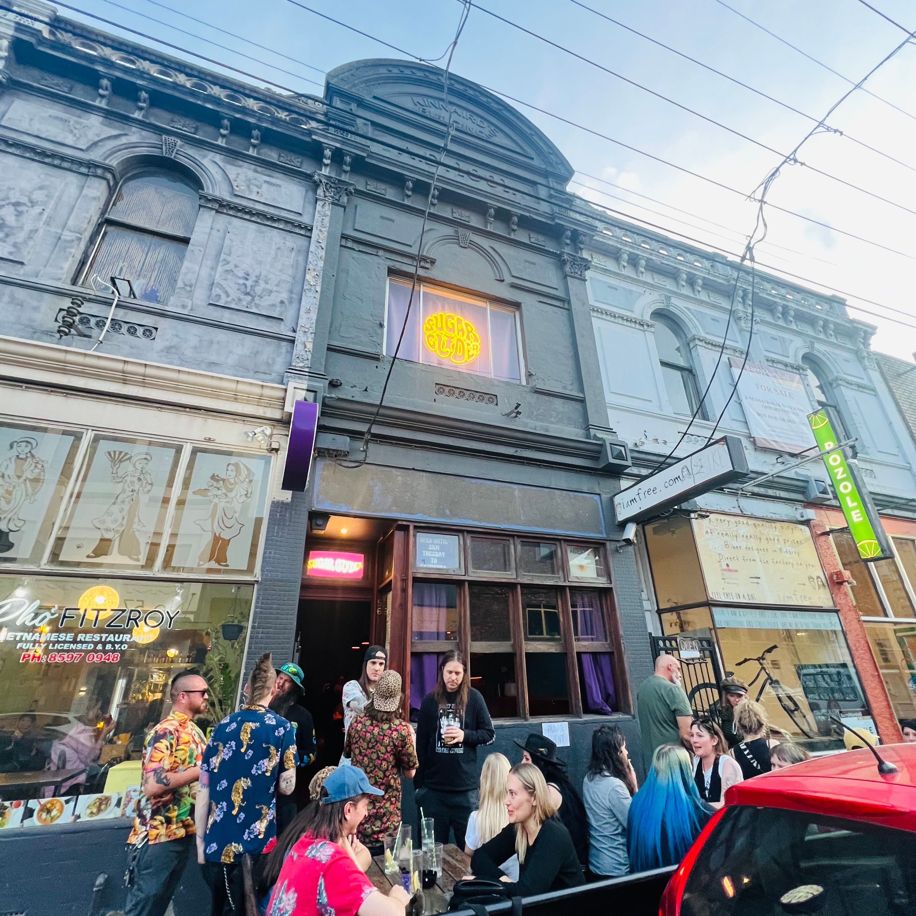 people enjoying a bar outside
