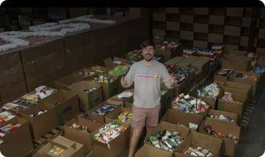 Volunteers sorting the first pallets of food