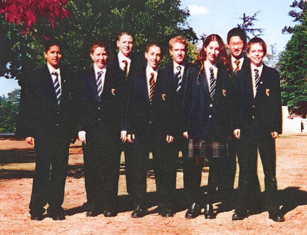 Pupils standing outside facing the camera