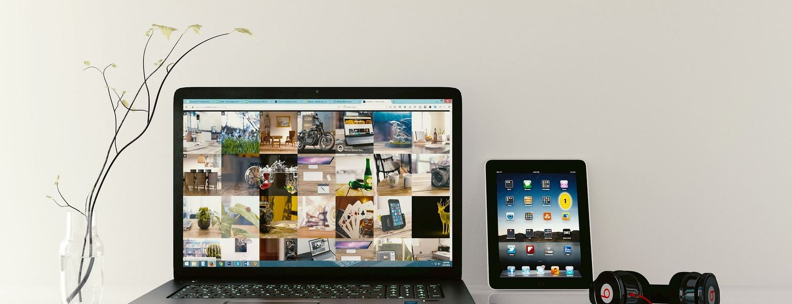 Laptop, phone, and headsets