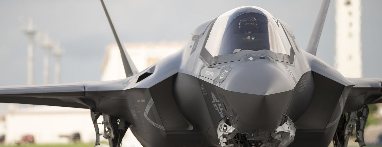 A fighter jet parked on a runway