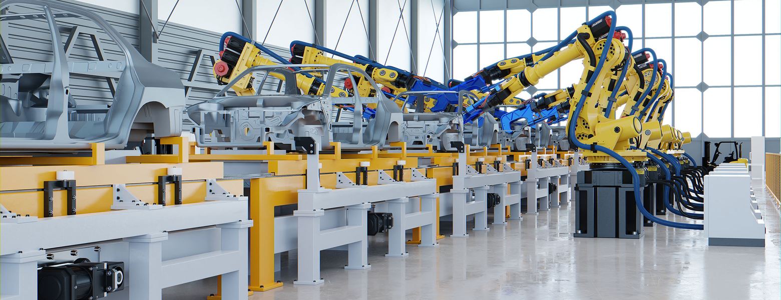A long row of yellow robotic arms along a production line