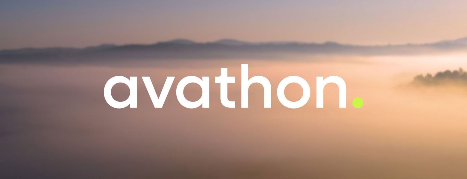 The Avathon wordmark over a mist-covered landscape at dawn