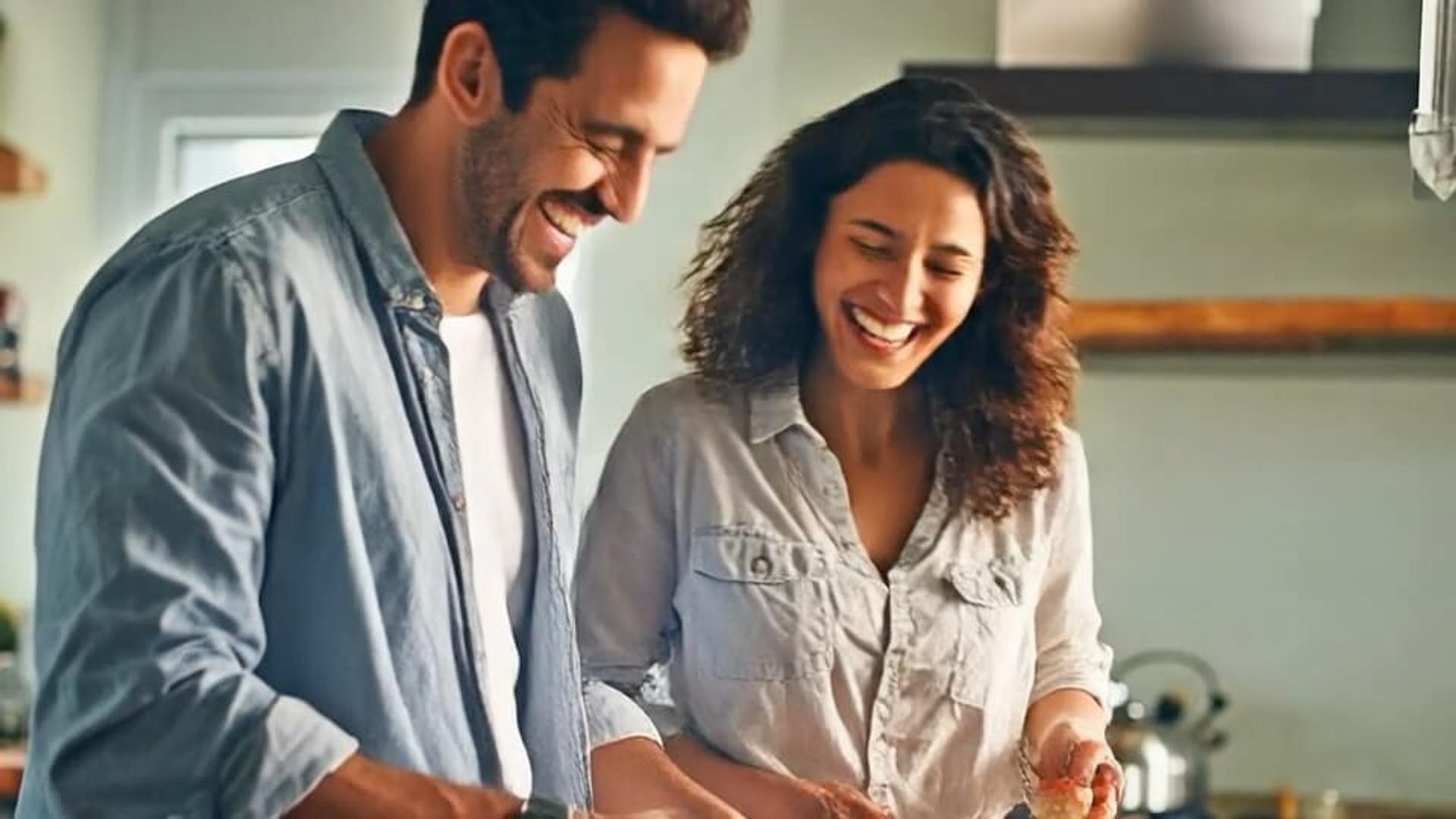 Video of Sarah and David having fun cooking in the kitchen