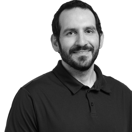 A profile photo of Khalid Abuhakmeh in black and white