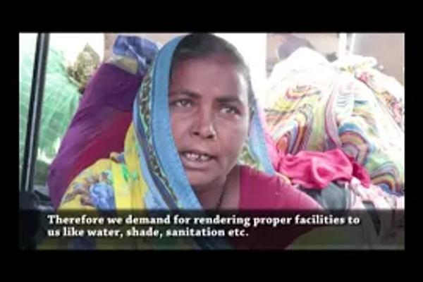 A women street vendor is speaking