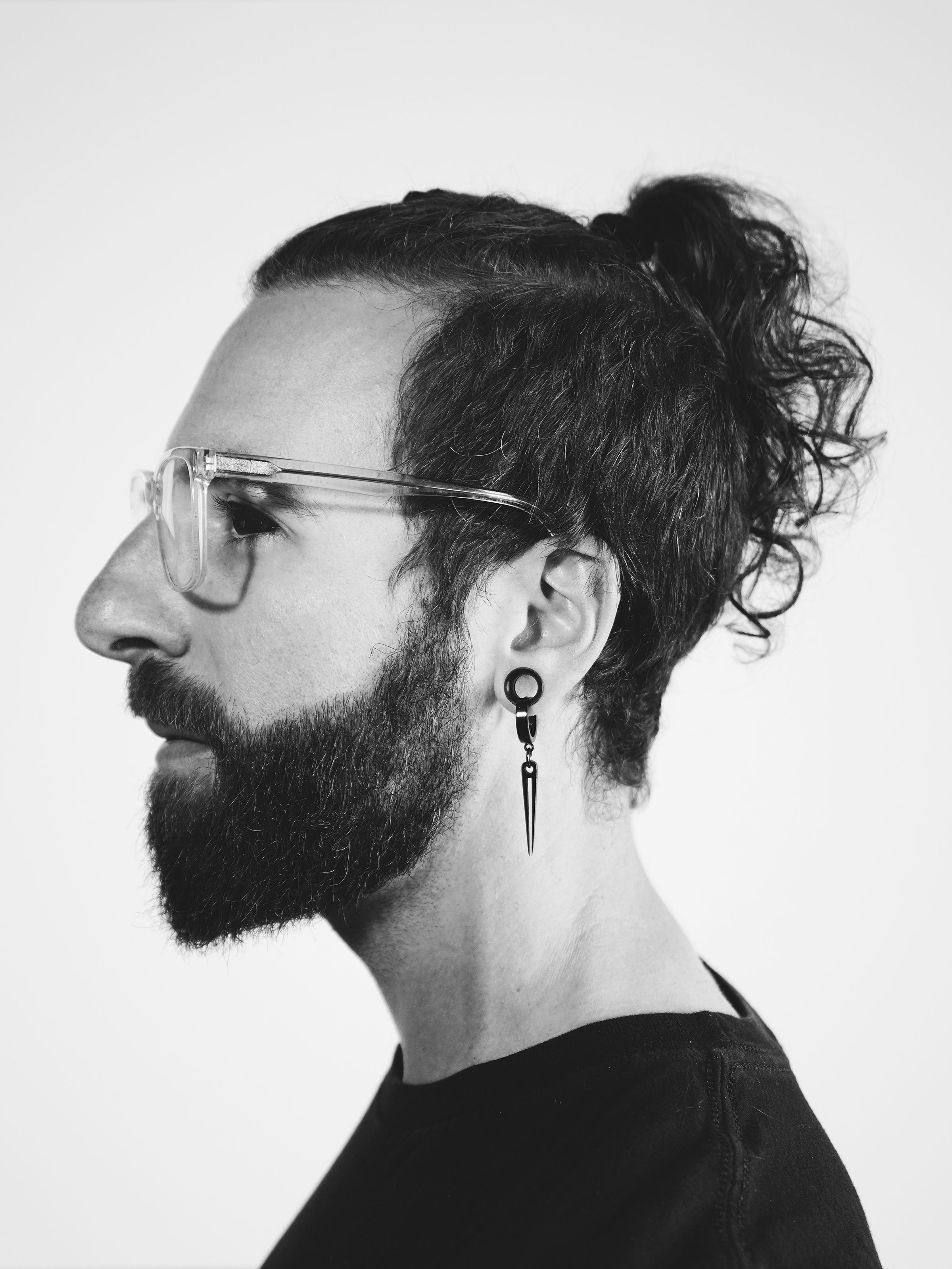 Headshot of Nick in black and white