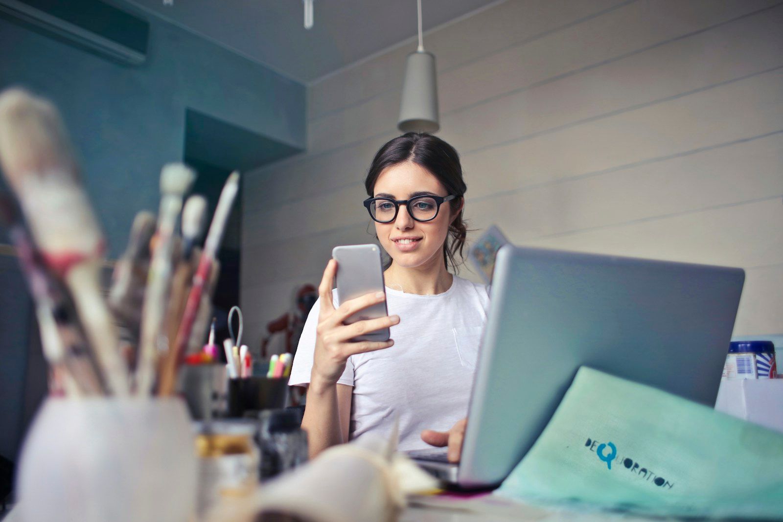 Reflective professional in a calm workspace noticing inner state and attention