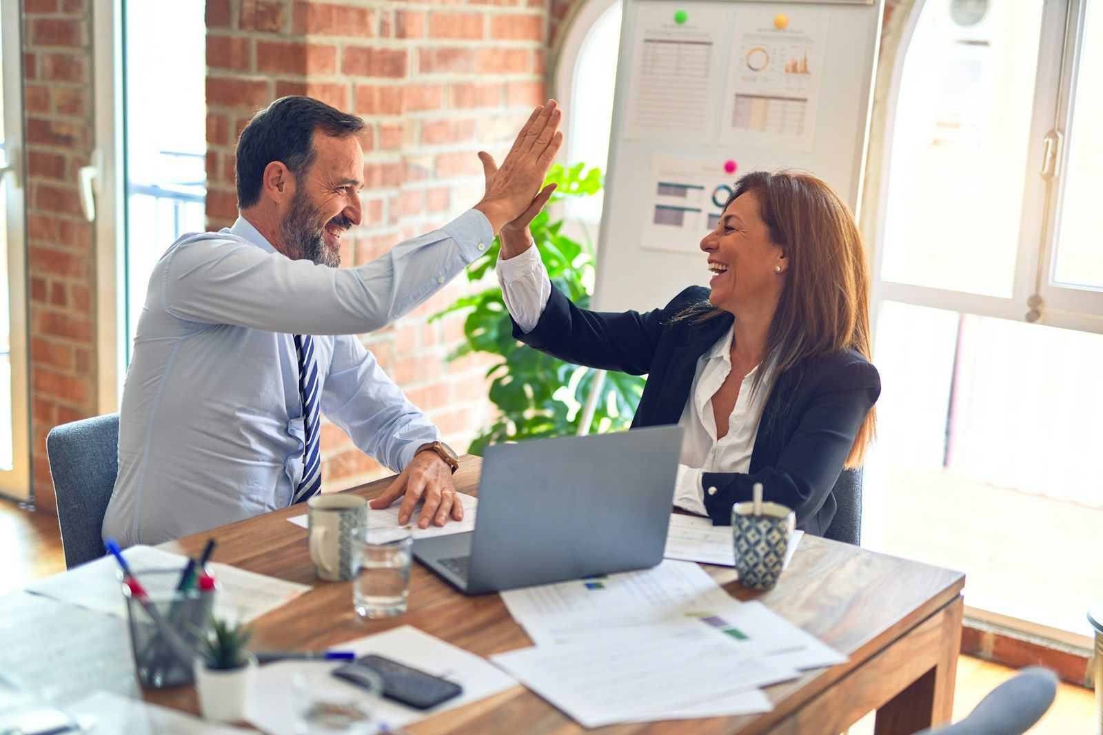 Professional one-to-one executive conversation showing attentive listening