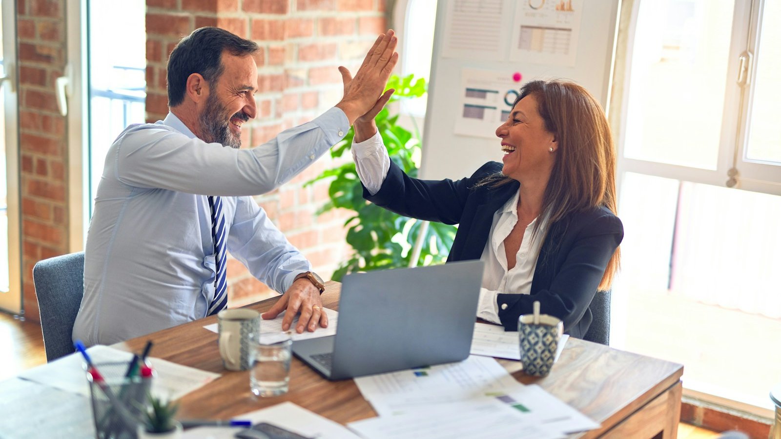Professional one-to-one executive conversation showing attentive listening