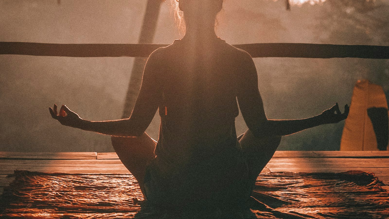 Person in quiet reflection, suggesting awareness becoming embodied action