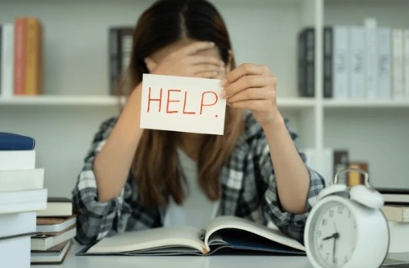 Secondary school student struggling with heavy study load and asking for help during exam preparation