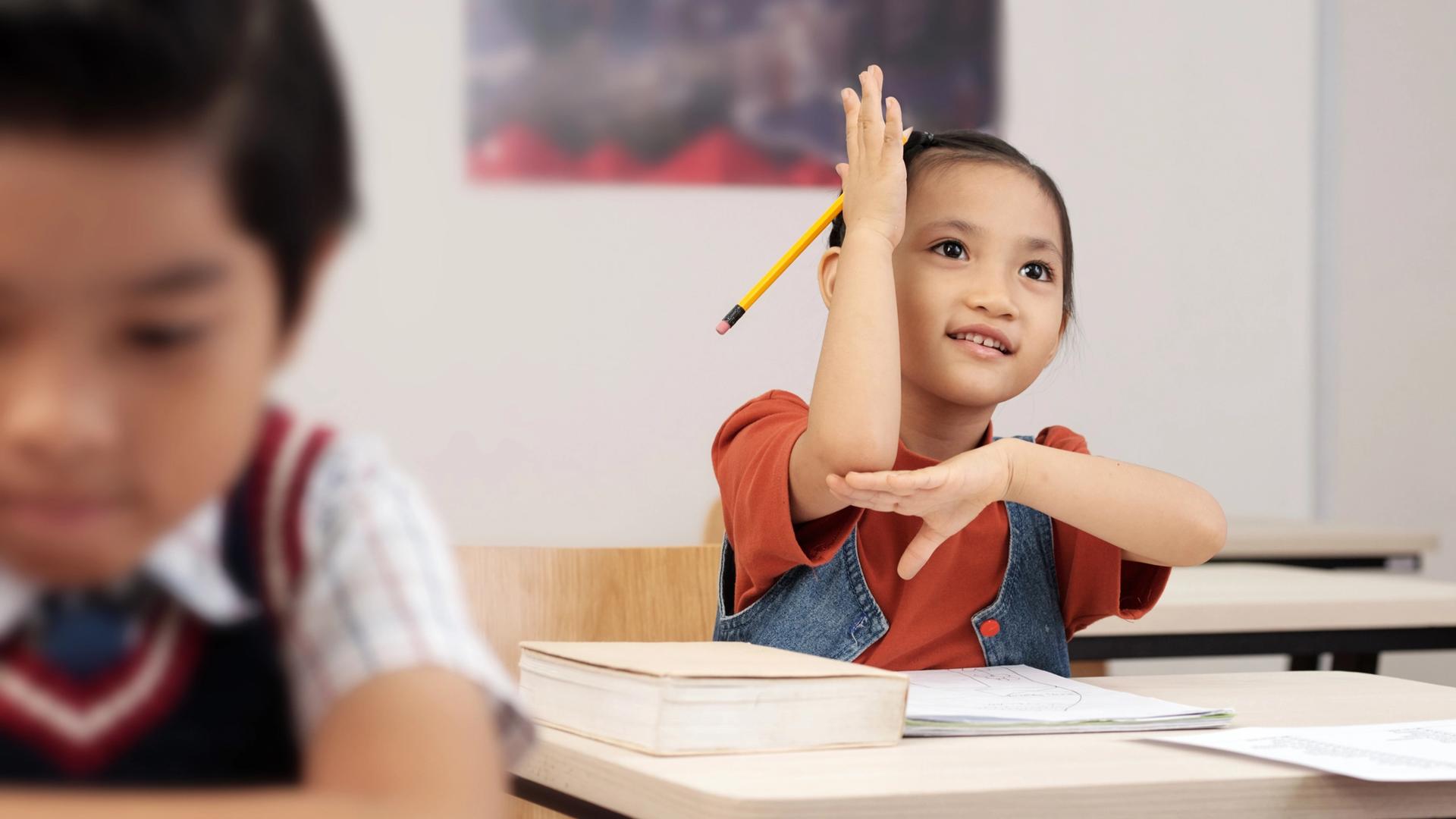 Primary school student completing a comprehension cloze passage exercise