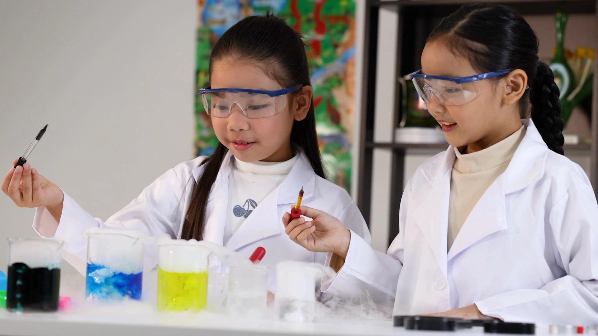 Primary 6 student practising PSLE Science open-ended answering techniques at a study desk