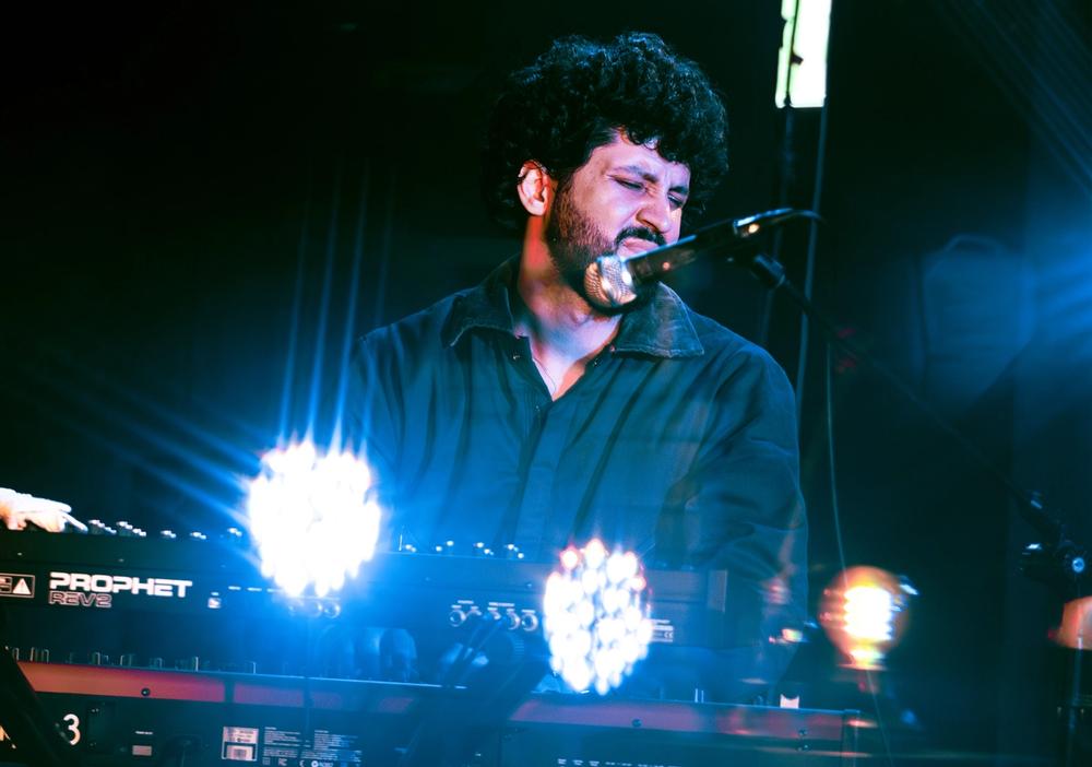 Kiefer playing his keyboard