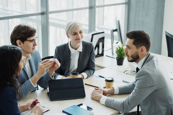 Diverse business team collaborating in a modern office.
