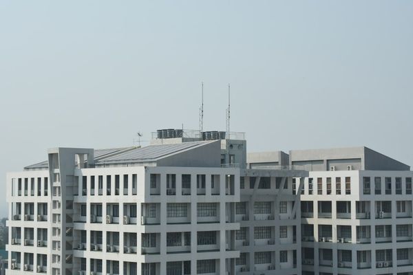 a large white building with a lot of windows
