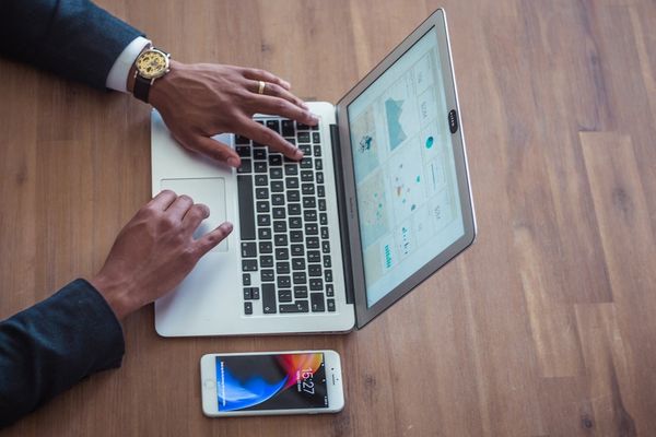 person using MacBook Air
