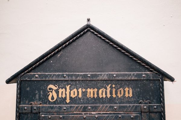 close-up photography of Information signage